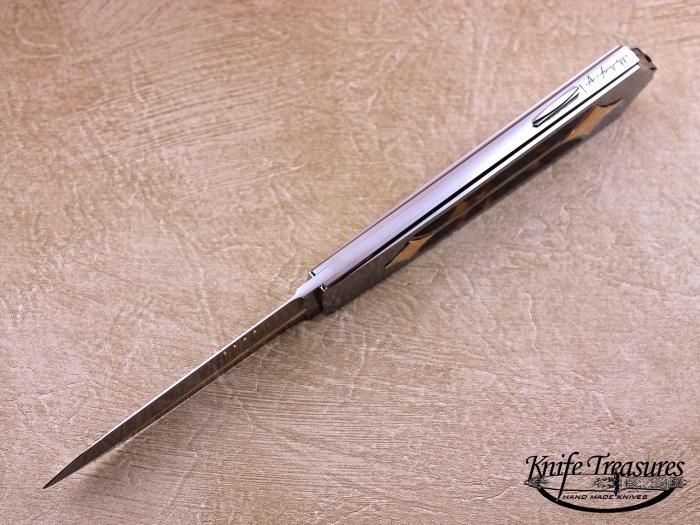 Custom Folding-Inter-Frame, Lock Back, ATS-34 Stainless Steel, Amber Knife made by Antonio Fogarizzu