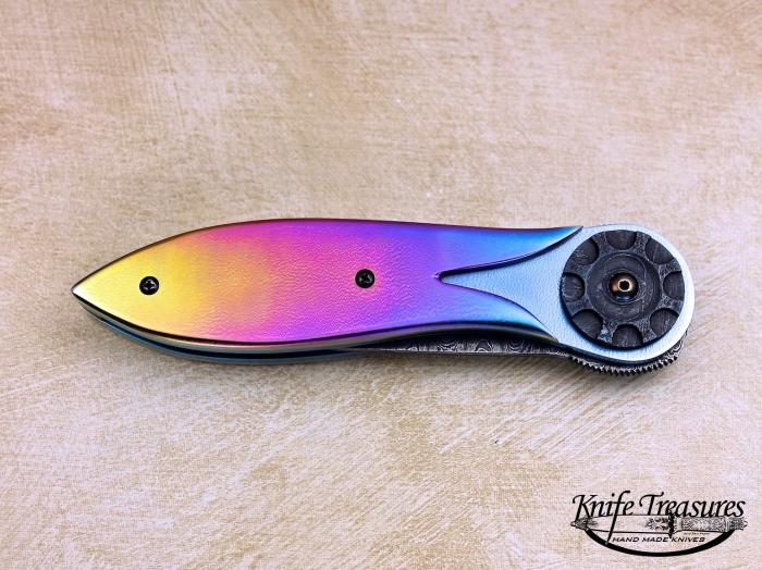 Custom Folding-Bolster, Liner Lock, Ladder Pattern Damascus, Rainbow Annodized Titanium Knife made by Randall Gilbreath