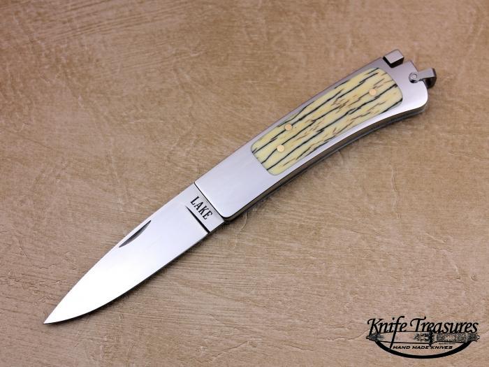 Custom Folding-Inter-Frame, Tail Lock, ATS-34 Stainless Steel, Surface Fossilized Mammoth Knife made by Ron Lake