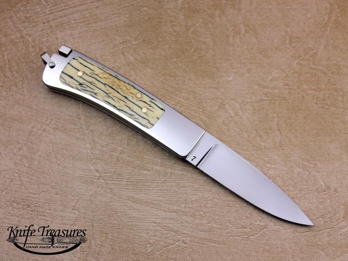 Custom Folding-Inter-Frame, Tail Lock, ATS-34 Stainless Steel, Surface Fossilized Mammoth Knife made by Ron Lake
