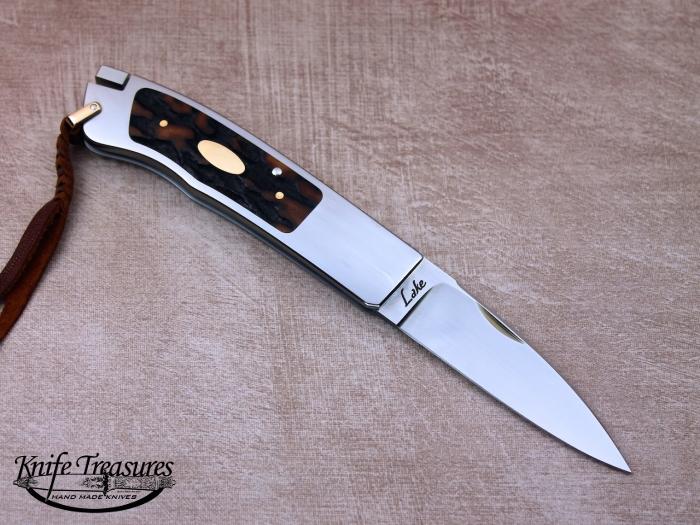 Custom Folding-Inter-Frame, Tail Lock, ATS-34 Stainless Steel, Amber Stag Knife made by Ron Lake