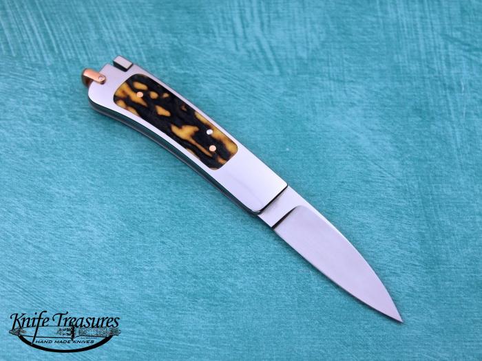 Custom Folding-Inter-Frame, Tail Lock, RWL-34 Stainless Steel, Red Amber Stag Knife made by Ron Lake