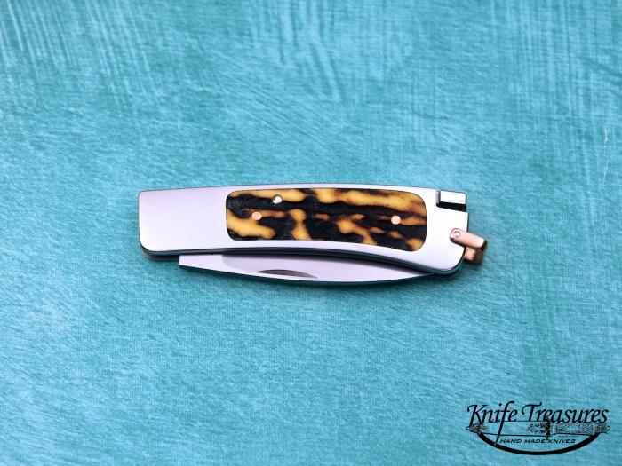 Custom Folding-Inter-Frame, Tail Lock, RWL-34 Stainless Steel, Red Amber Stag Knife made by Ron Lake