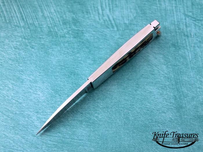 Custom Folding-Inter-Frame, Tail Lock, RWL-34 Stainless Steel, Red Amber Stag Knife made by Ron Lake