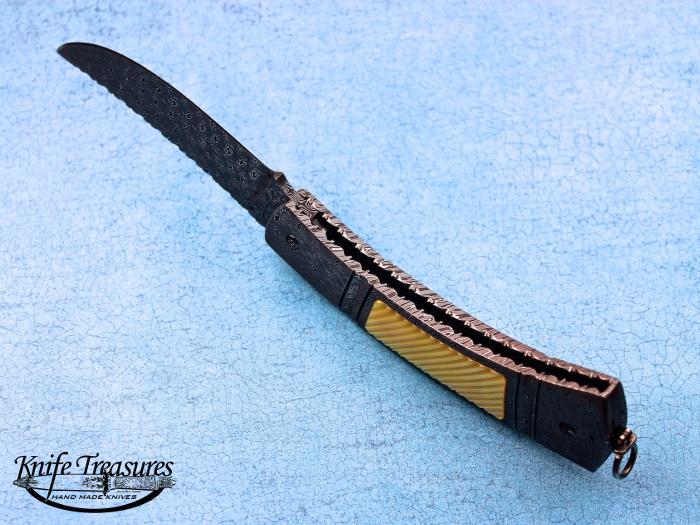 Custom Folding-Inter-Frame, Tail Lock, Jerry Rados Turkish Twist Damascus, Gold Lip Pearl Knife made by Jerry Rados