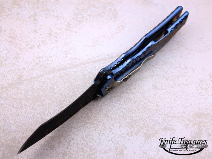 Custom Folding-Inter-Frame, Liner Lock, Carved Radiant Chad Nichols Damascus Steel, Annodized Titanium Knife made by Darrel Ralph