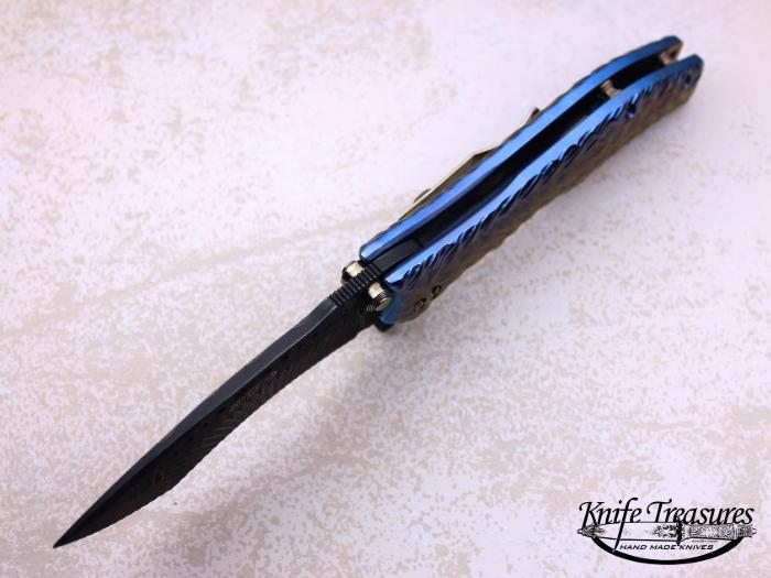 Custom Folding-Inter-Frame, Liner Lock, Carved Radiant Chad Nichols Damascus Steel, Annodized Titanium Knife made by Darrel Ralph