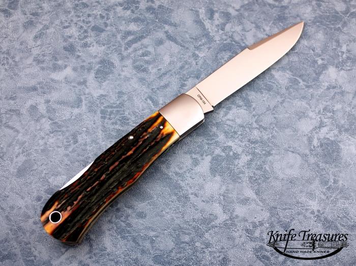 Custom Folding-Bolster, Lock Back, CPM-154, Red Amber Stag Knife made by Joel Chamblin