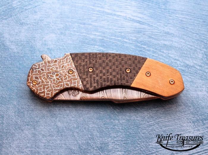 Custom Folding-Bolster, Liner Lock, Twist Pattern Damascus, Lighting Strike Carbon Fiber Knife made by Patrick Famin