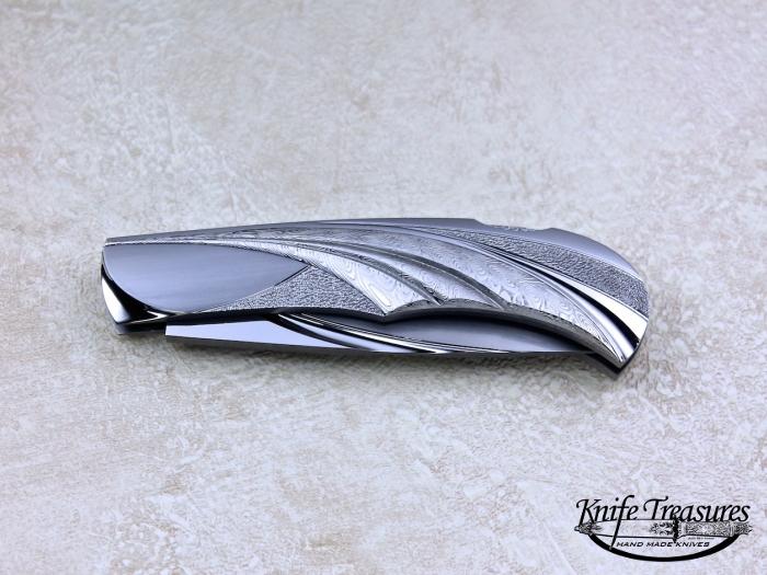 Custom Folding-Inter-Frame, Lock Back, ATS-34 Stainless Steel, 416 Stainless Steel & Damascus Knife made by Wolfgang Loerchner