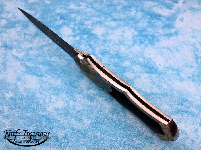 Custom Folding-Inter-Frame, Lock Back, Damasteel, Black Lip Pearl with Gold Escutcheon Knife made by Rick Genovese