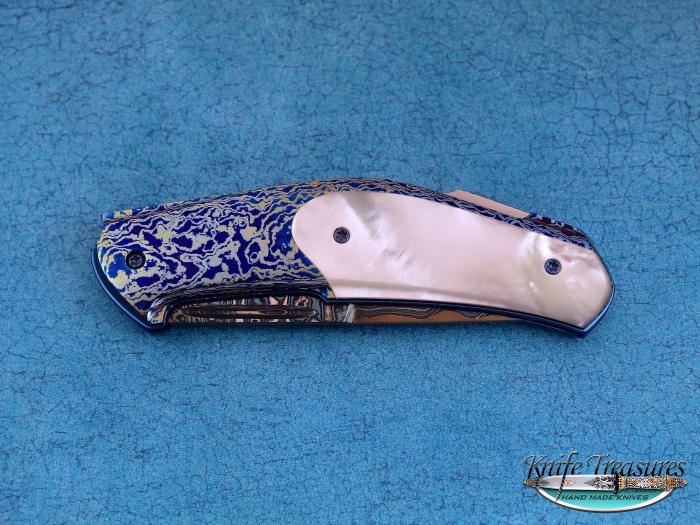 Custom Folding-Bolster, Lock Back, Blue Nickel Damascus with RWL-34 Core, Mother Of Pearl Knife made by Jakob & Simon Nylund