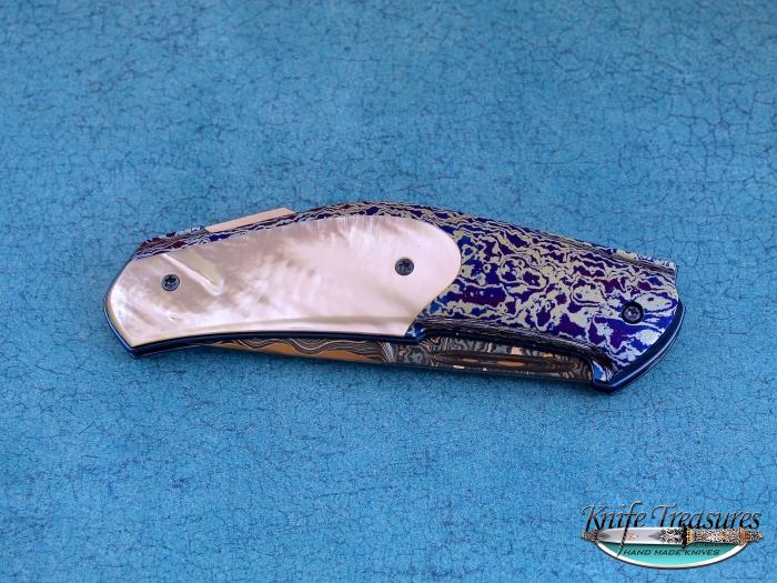Custom Folding-Bolster, Lock Back, Blue Nickel Damascus with RWL-34 Core, Mother Of Pearl Knife made by Jakob & Simon Nylund