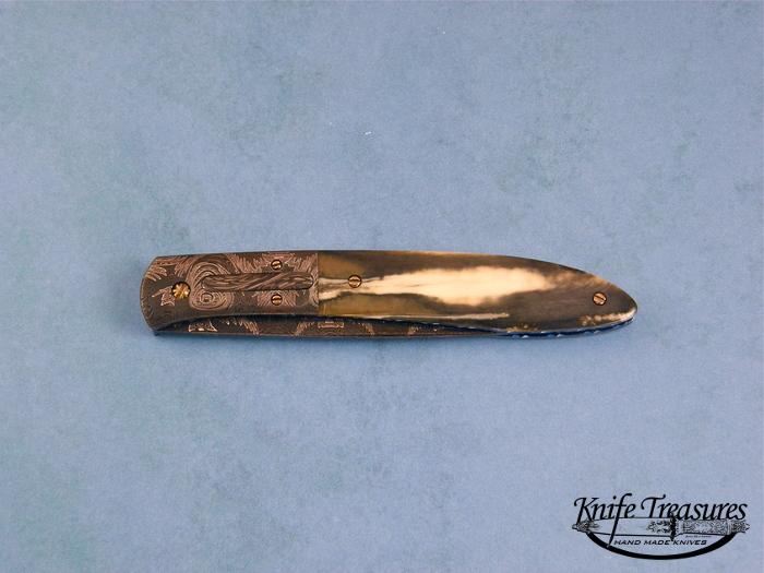 Custom Folding-Bolster, Liner Lock, Damascus Steel by Maker, Fosilized Walrus  Knife made by Don  Hanson III