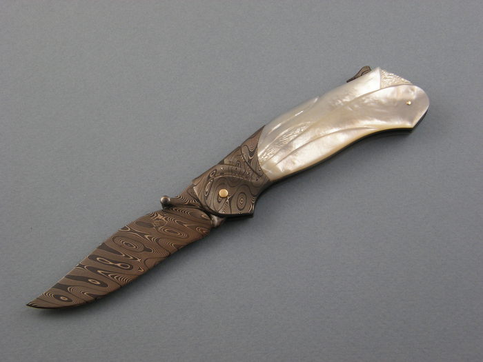 Custom Folding-Bolster, Tail Lock, Carved Damascus Steel by Maker, Carved Mother Of Pearl Knife made by David Broadwell