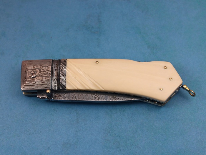 Custom Folding-Bolster, Lock Back, Damascus Steel by Maker, Fluted Fosilized Mammoth Knife made by Barry Davis