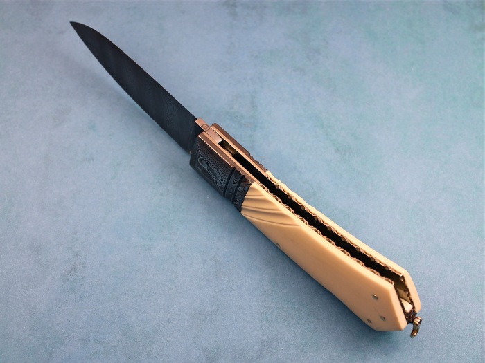 Custom Folding-Bolster, Lock Back, Damascus Steel by Maker, Fluted Fosilized Mammoth Knife made by Barry Davis
