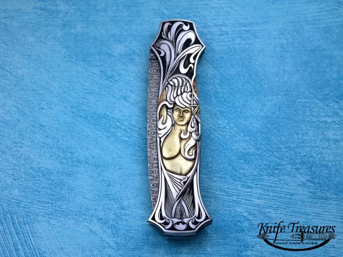 Custom Folding-Inter-Frame, Mid-Lock, Sharks Tooth Pattern Dmascus, 416 Stainless Steel Knife made by Joe Kious