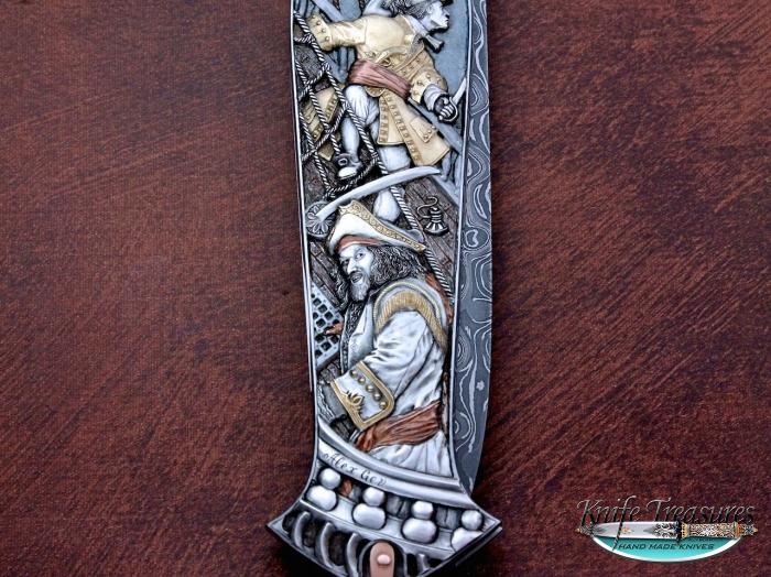 Custom Folding-Inter-Frame, Lock Back, Mike Norris Bent Lighting Damascus, 416 Stainless Steel Knife made by Warren Osborne